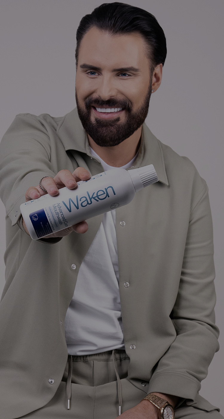 Rylan_holding_mouthwash_bottle_mobile_88fb3e5f-84de-49da-989d-e6b59daf088e.png
